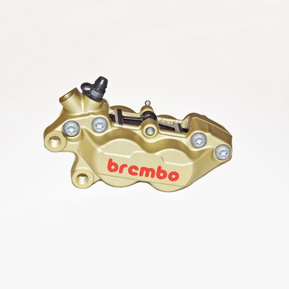 Pinza Freno anteriore fissa assiale Brembo P4 30/34 SX corpo oro logo rosso 4 pistoncini 30 mm/34 mm interasse fori 40 mm