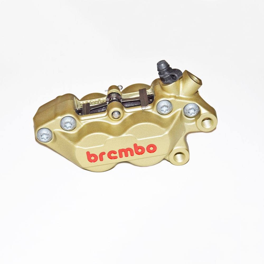 Pinza Freno anteriore fissa assiale Brembo P4 30/34 DX corpo oro logo rosso 4 pistoncini 30 mm/34 mm interasse fori 40 mm