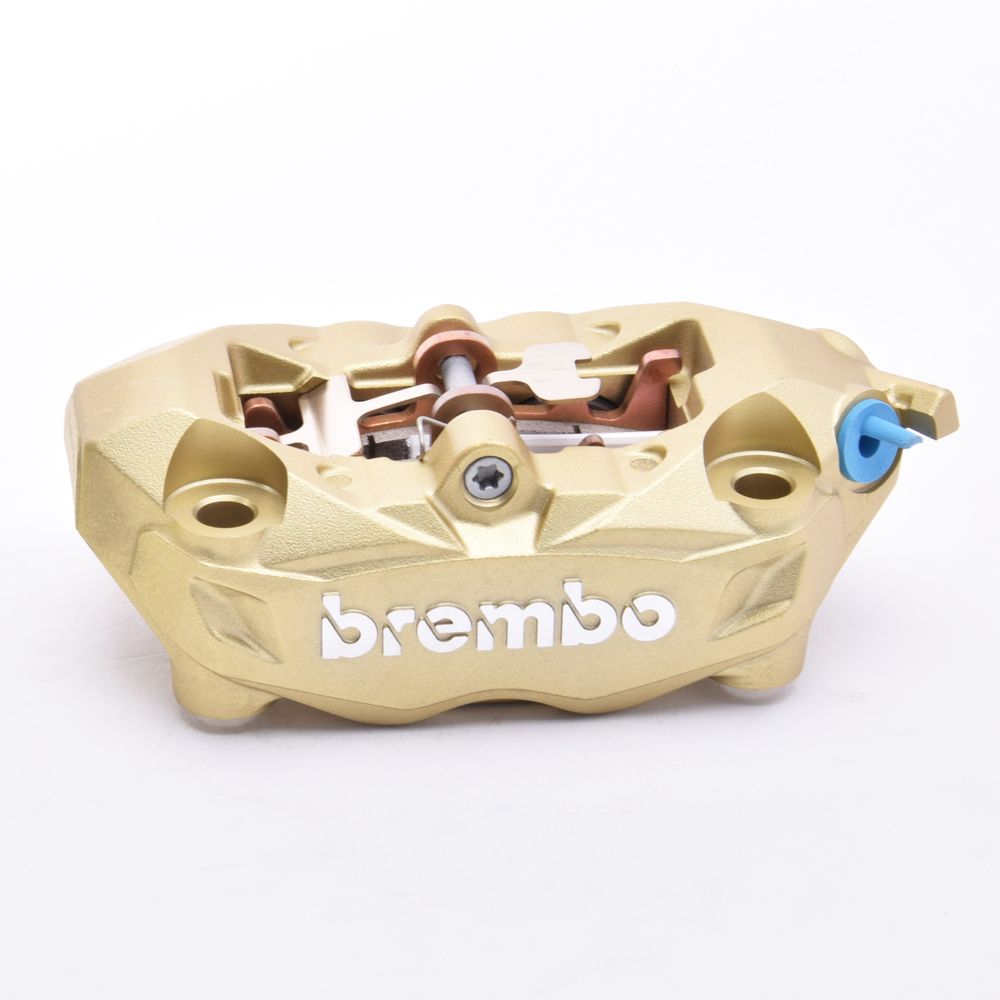 Pinza Freno Anteriore Fissa Radiale Brembo M4 32 DX corpo oro 4 pistoncini 32 mm interasse fori 100 mm