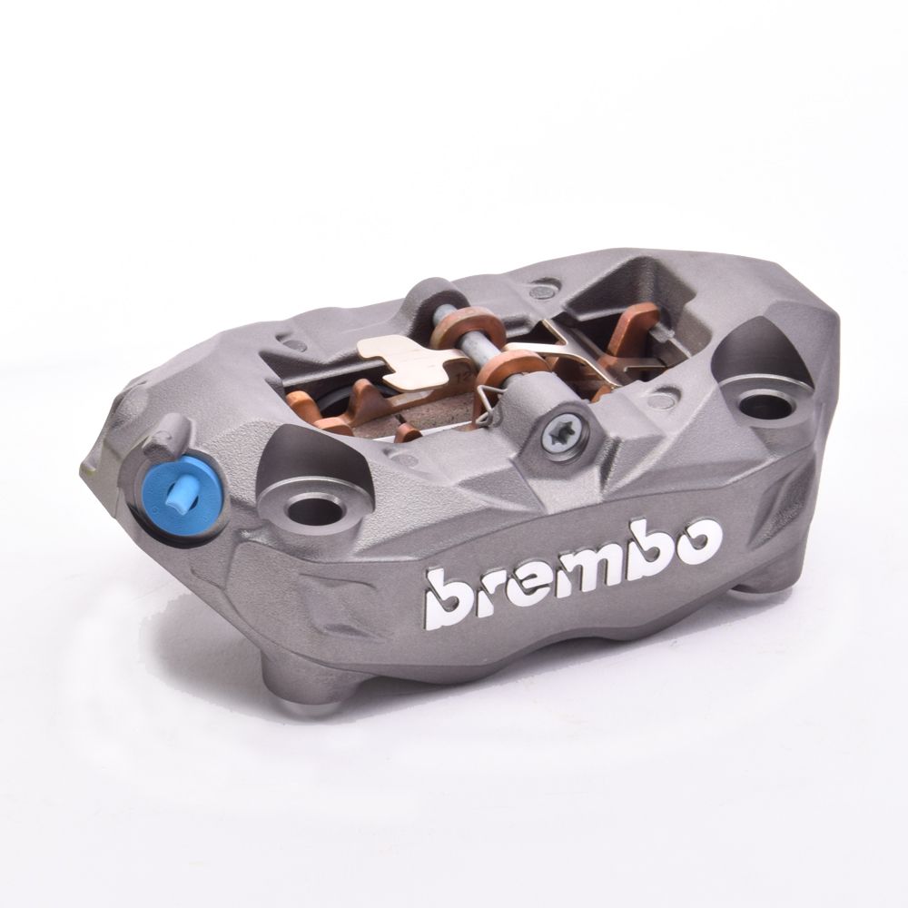 Pinza Freno Anteriore Fissa Radiale Brembo M4 32 SX corpo titanio 4 pistoncini 32 mm interasse fori 100 mm